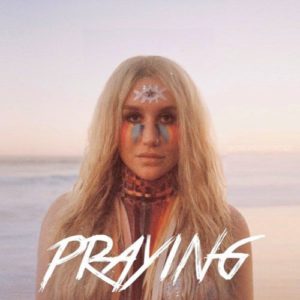 Kesha praying